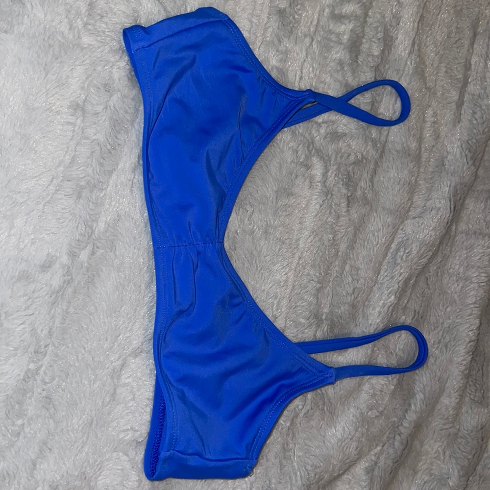 Blue bikini top, never worn, new